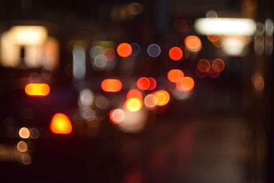 Defocused image of illuminated lights at night