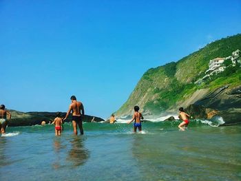 Tourists enjoying at beach