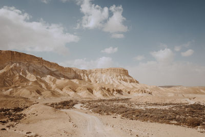 Scenic view of desert against sky