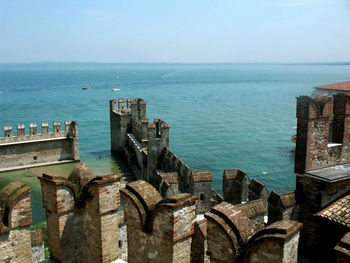 High angle view of old sea against sky