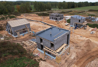 High angle view of buildings on field