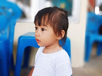 Portrait of cute boy looking away