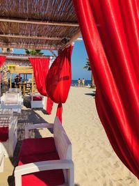 Red flags hanging on beach