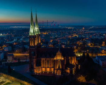 High angle view of buildings at night