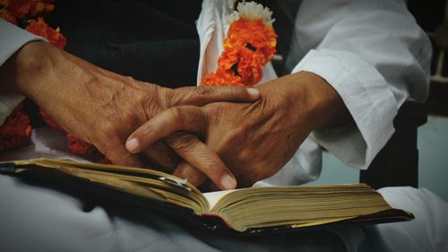 Close-up of a hand holding hands