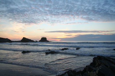 Scenic view of sea at sunset