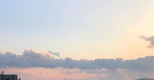 Low angle view of dramatic sky during sunset