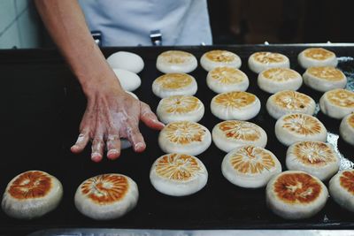 High angle view of person preparing food