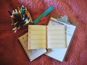 High angle view of paper on table