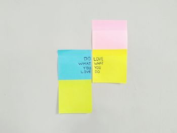 Close-up of yellow paper over white background