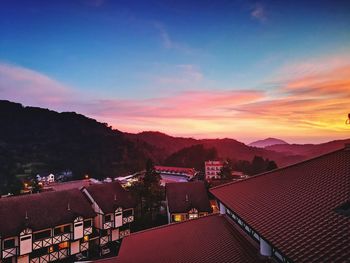 High angle view of townscape against sky during sunset