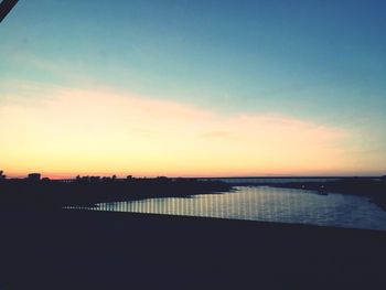 View of calm sea at sunset