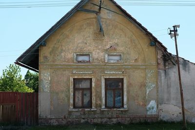 Low angle view of old building against sky