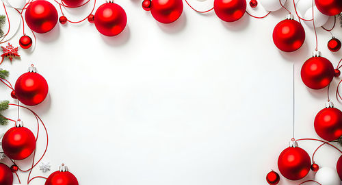 Directly above shot of christmas decorations on white background