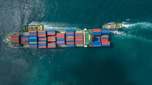 Aerial view container ship full load logistic container, global business logistics import export.