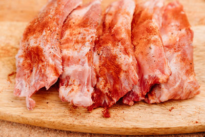 Close-up of meat on cutting board