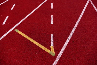 Red arrow symbol on the road