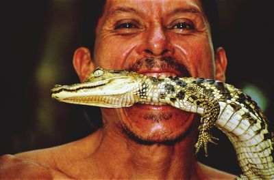 Close-up portrait of man wearing mask