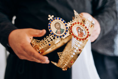 Close-up of man holding hands