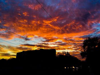 Low angle view of cloudy sky at sunset