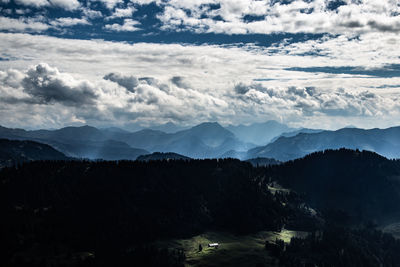 Scenic view of silhouette mountains against sky