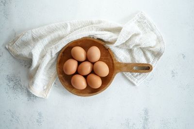 High angle view of eggs in container on table