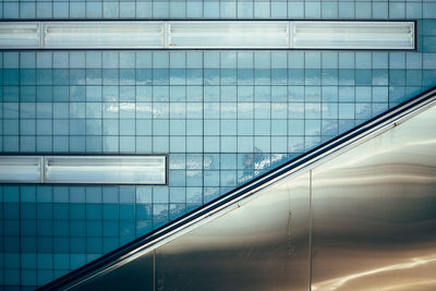 Backgrounds of subway station wall with escalator