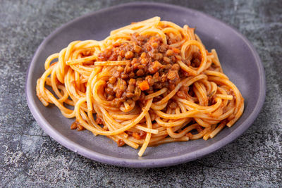 Close-up of noodles in plate on table