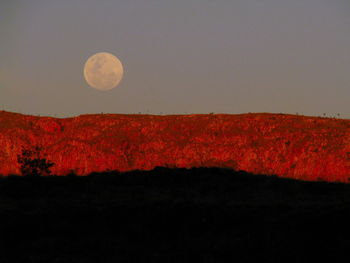 Scenic view of moon against sky at night