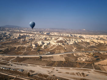 Aerial view of hot air balloon against sky