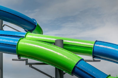 Close-up of blue pipe against sky