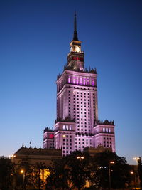 Low angle view of building against sky at night