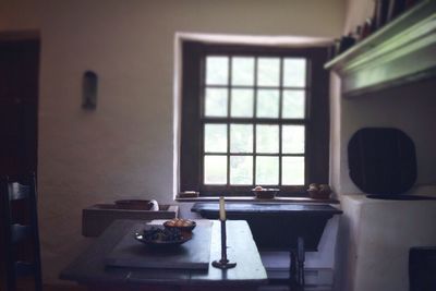 Close-up of table and window at home