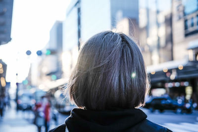 Rear view of woman on street