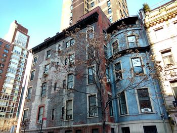 Low angle view of buildings against sky