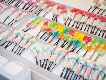 High angle view of multi colored candy and lollipops at amphawa floating market, thailand