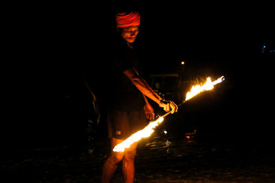 View of fire burning at night