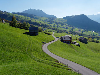 Scenic view of agricultural field against sky