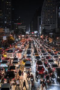 High angle view of traffic on city street at night