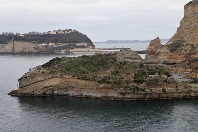 Scenic view of sea and rocks against sky