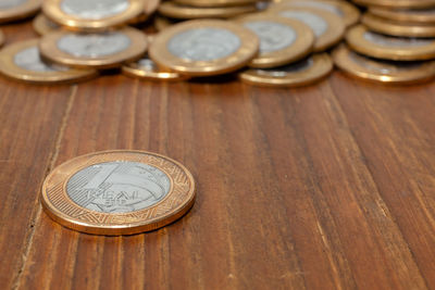 High angle view of coins on table