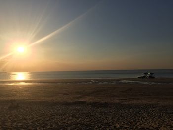 Scenic view of sea at sunset