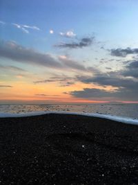 View of calm sea at sunset