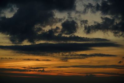 Low angle view of dramatic sky during sunset