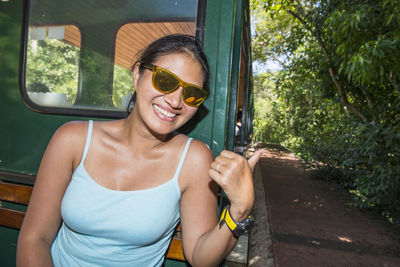 Woman on the passenger train to view the iguazu waterfalls