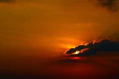 Scenic view of dramatic sky during sunset