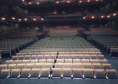 High angle view of empty chairs in stadium