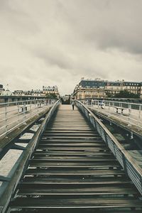 View of bridge against cloudy sky