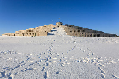 View of building against clear blue sky