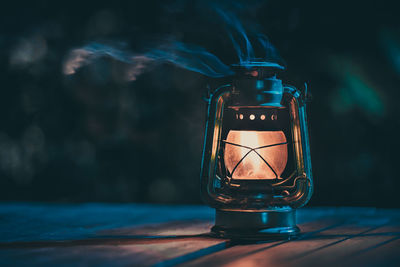 Close-up of illuminated light bulb